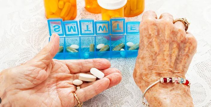 medication management for seniors, senior holding pills